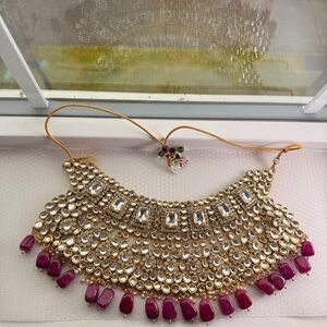 Elegant gold and pink chokar necklace